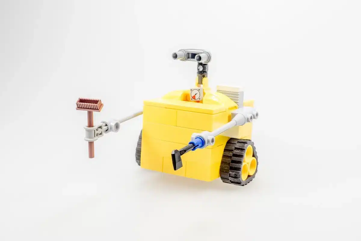 Técnico a trabalhar num ecrã com visualização de treino de modelo de IA