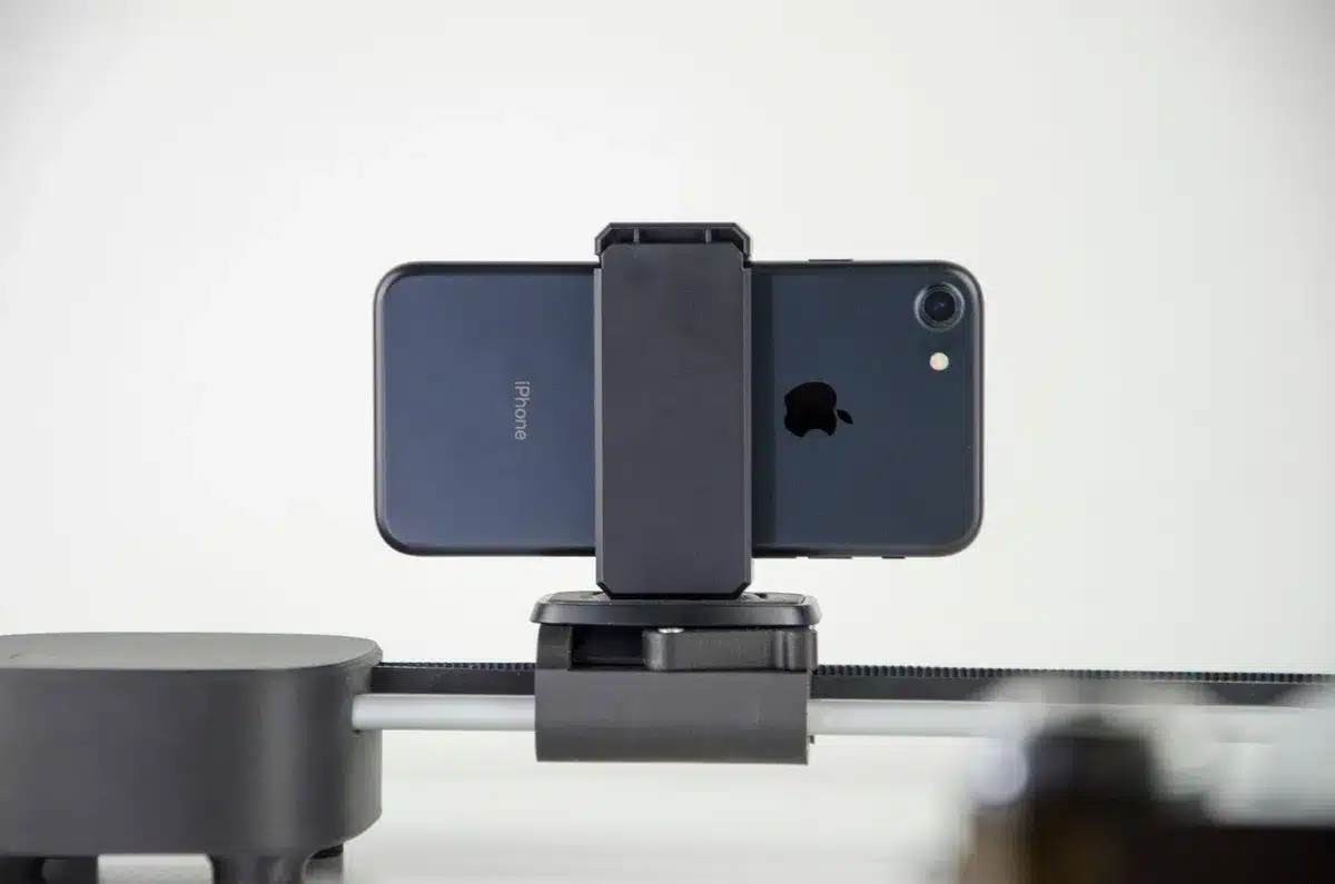 empty retail shelf with anonymous boxed smartphones and price tags, soft natural light