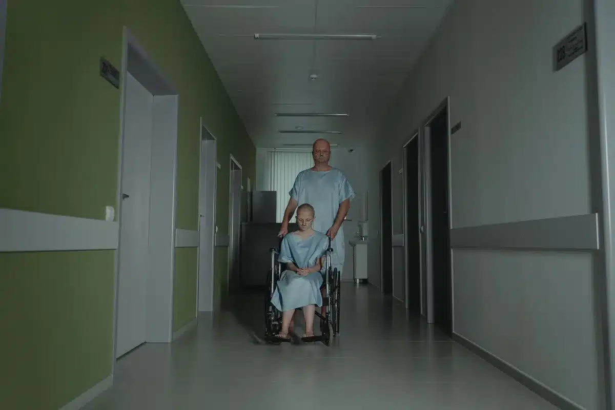 Empty hospital corridor with anonymous nurse station and a single RFID reader mounted on the wall