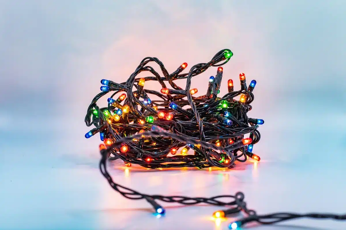 close-up of boxed LED string lights on a supermarket shelf, price tag visible but unreadable