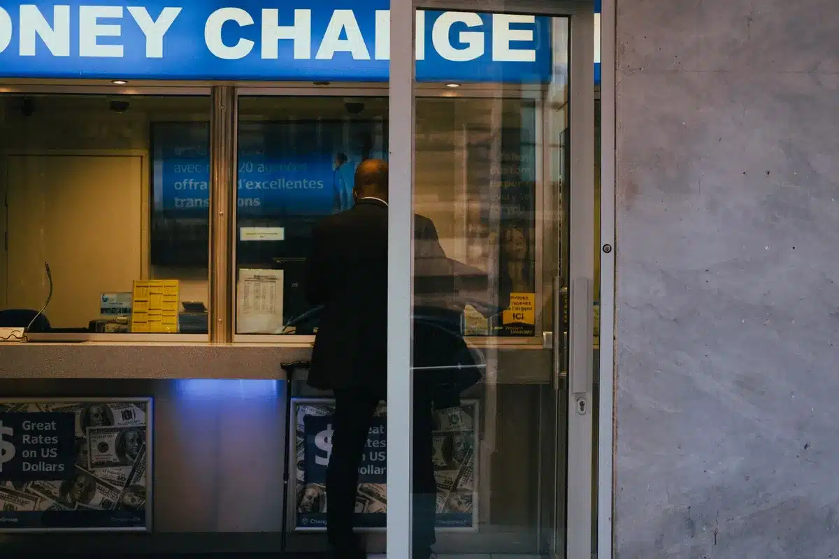 empty bank branch interior with anonymous counters and digital screens
